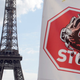 A protest banner hung by members of the Falun Gong spiritual movement during a demonstration in front of the Eiffel Tower in 2013.